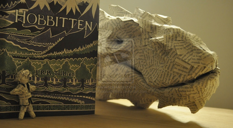 Illustration for article titled Artist Turns The Hobbit Book Into Paper Sculpture Of Smaug
